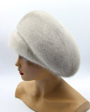 Grey-blue mink fur beret three-quarter right view showing sapphire fur sheen and full volume silhouette