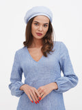 Handmade blue linen beret for women smiling portrait, lightweight summer hat made in Ukraine