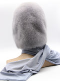 Back view iris grey mink fur hood on mannequin showing full mink hood coverage and coordinated fabric scarf