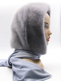 Front angled view iris grey mink hood on mannequin showing lavender-grey tone shift in cool light