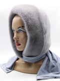 Iris grey dyed mink fur hood scarf on mannequin front three-quarter view showing lavender-grey mink and coordinated pale fabric scarf