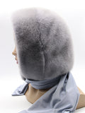 Side profile iris grey dyed mink fur hood scarf on mannequin showing hood depth and plain fabric scarf end