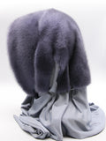 Three-quarter back view iris purple mink fur hat hood with blue-grey jersey shawl draped across shoulders