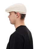 Man wearing ivory cotton flat cap full body back view