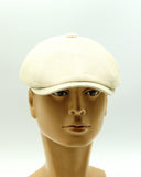 Ivory linen canvas newsboy cap mannequin side profile brim detail