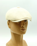 Ivory linen newsboy cap mannequin three quarter left view structure
