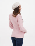 Ivory linen women's beret hat smiling portrait, showing adjustable fit and cream color tone