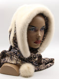 Ivory mink fur hat hood front view on mannequin showing warm white mink and abstract brown-grey floral scarf