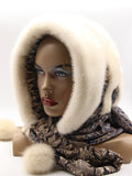 Side profile ivory mink fur hat hood with abstract floral scarf showing white mink pompon at scarf end