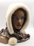 Three-quarter view ivory mink fur hat hood showing natural warm white mink and floral patterned scarf drape