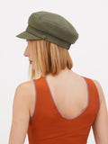 Back view of khaki linen newsboy cap showing rounded crown shape