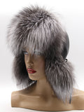 Left profile of leather aviator cap with tall silver fox brim and fox ear flap