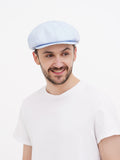 Side profile light blue linen newsboy cap soft straight visor