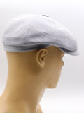 Light blue linen newsboy hat on mannequin front view structure