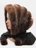 Light brown mink brown suede striped fur hat cowl front view showing warm tonal alternating stripe and black ties
