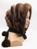 Close view light brown mink brown suede striped cowl showing subtle texture difference between warm mink pile and flat suede