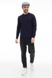 Full body shot man wearing light grey tweed flat cap with all navy outfit