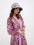Woman wearing light grey cotton bucket cloche hat with pink printed dress