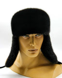 Man wearing black mink suede bomber fur hat earflaps down side