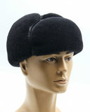 Man wearing black sheepskin ushanka front facing