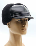 Man wearing black visor cap front facing