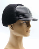 Man wearing black sheepskin visor cap side profile