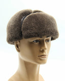 Man wearing brown aviator ushanka front facing
