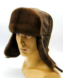 Angled view man wearing brown mink bomber ushanka earflaps down