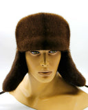 Man wearing brown mink suede bomber fur hat earflaps down front
