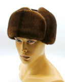 Close front view man wearing brown mink suede bomber ushanka