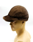 Angled view man wearing brown pastel mink fur baseball cap