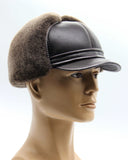 Man wearing brown sheepskin visor cap front facing