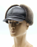 Man wearing brown visor ushanka earflaps down side