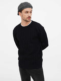 Man wearing grey baker boy hat casual outfit showing how cap pairs with everyday wear