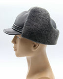 Man wearing grey visor cap earflaps down side