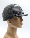 Man wearing grey sheepskin visor cap front facing