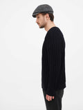 Man wearing grey wool newsboy cap side angle showing comfortable fit and cotton lining