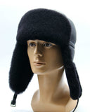 Man wearing sheepskin bomber fur hat earflaps down front