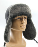 Front view man wearing sheepskin trapper hat