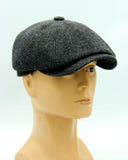 Man wearing green tweed newsboy cap newsboy hat front view