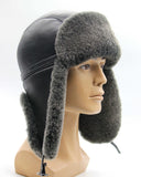 Man wearing sheepskin trapper aviator hat side view