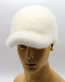 Man wearing white mink fur baseball cap side view