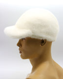 Angled view man wearing white mink fur baseball cap