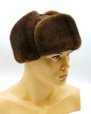 Brown mink fur hat and suede bomber ushanka front view earflaps up