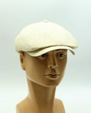 Natural linen baker boy cap front view on mannequin