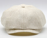 Natural linen newsboy cap side angle structured crown