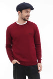 Three quarter view man wearing navy tweed 8-panel newsboy cap with burgundy sweater
