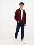 Man wearing navy blue tweed cap full body front view plaid jacket