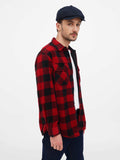 Man wearing navy tweed newsboy cap full body side angle casual wear