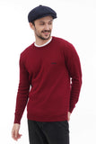 Man wearing navy 8-panel baker boy hat casual stance burgundy sweater front view